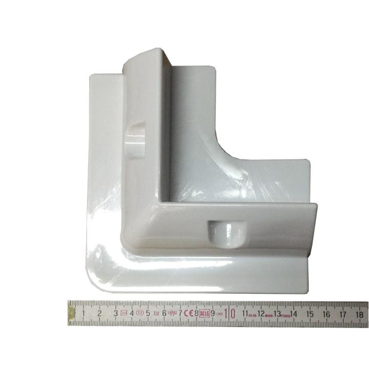 Esquina de fijación para panel en autocaravana