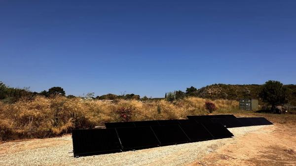 Photovoltaic panels installed on a ground-mounted structure